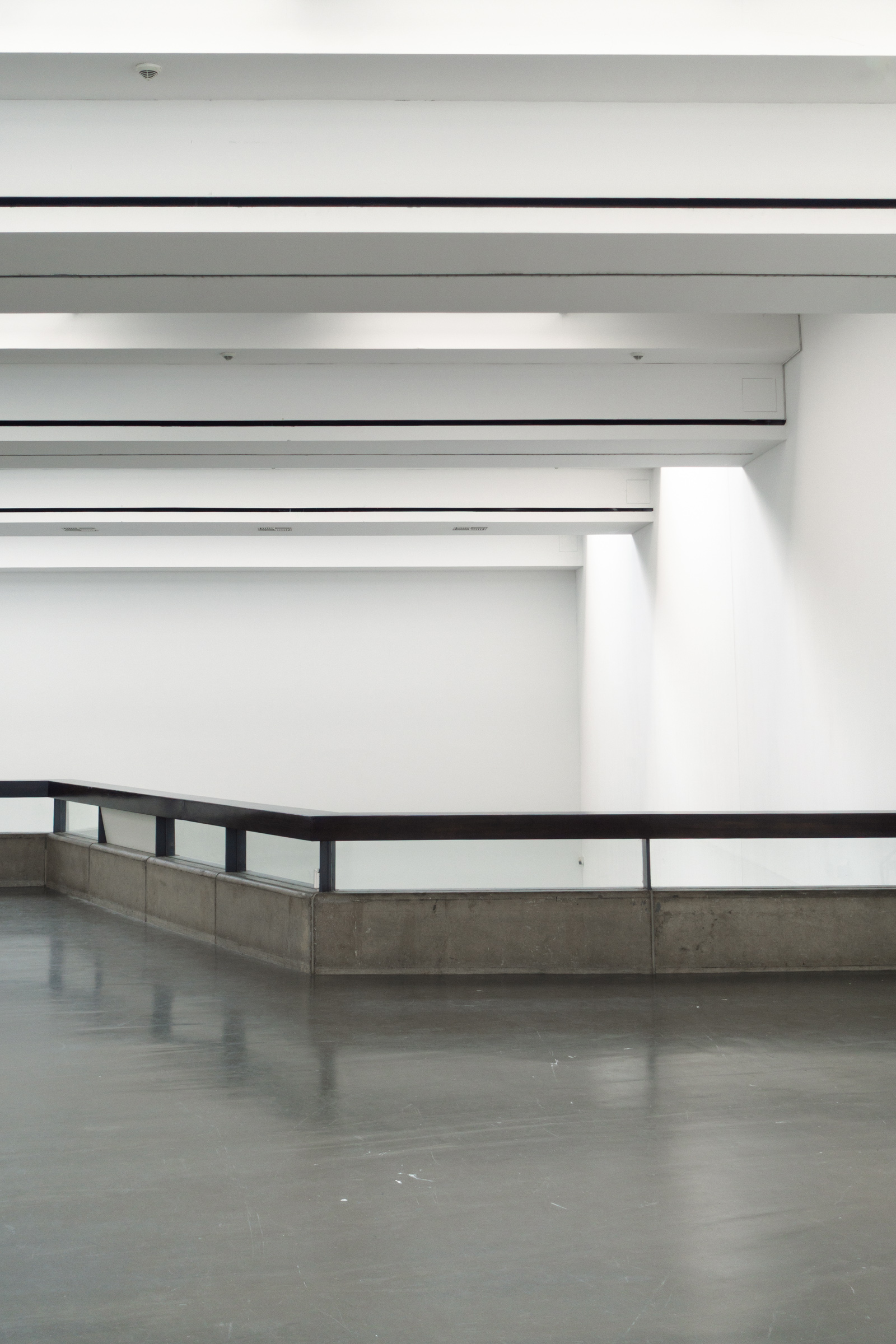 Concrete staircase with steel handrail and skylight above, Kunsthalle Düsseldorf