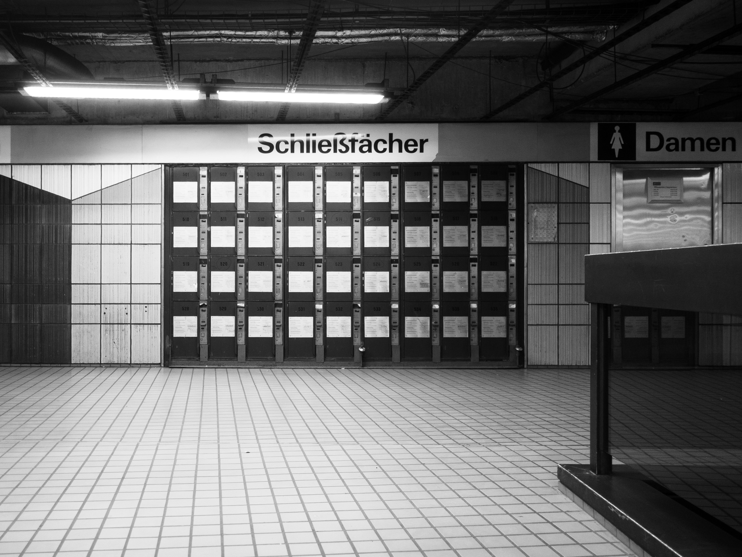 Wall of lockers inside the underground station at Friesenplatz, Cologne