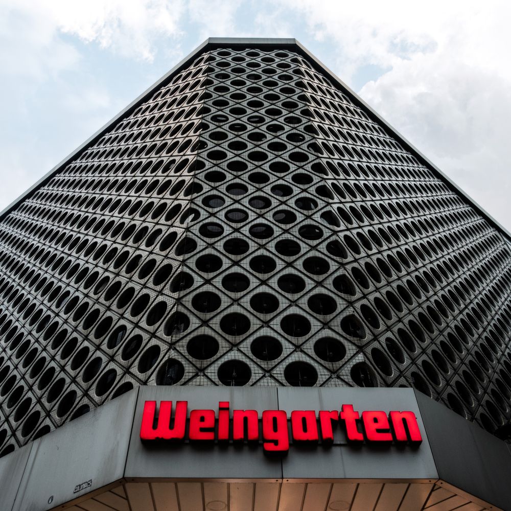 Low-angle view of the perforated concrete facade of the Weingarten building, Friesenplatz, Cologne