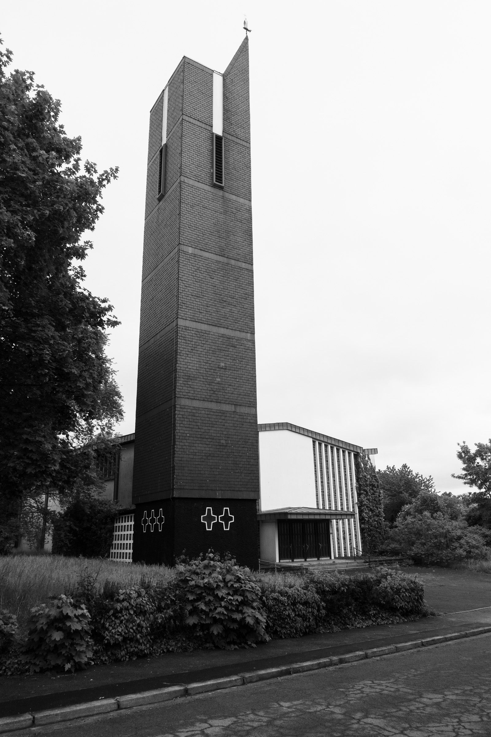 St. Michael Kirche Völklingen — bell tower rising above street level